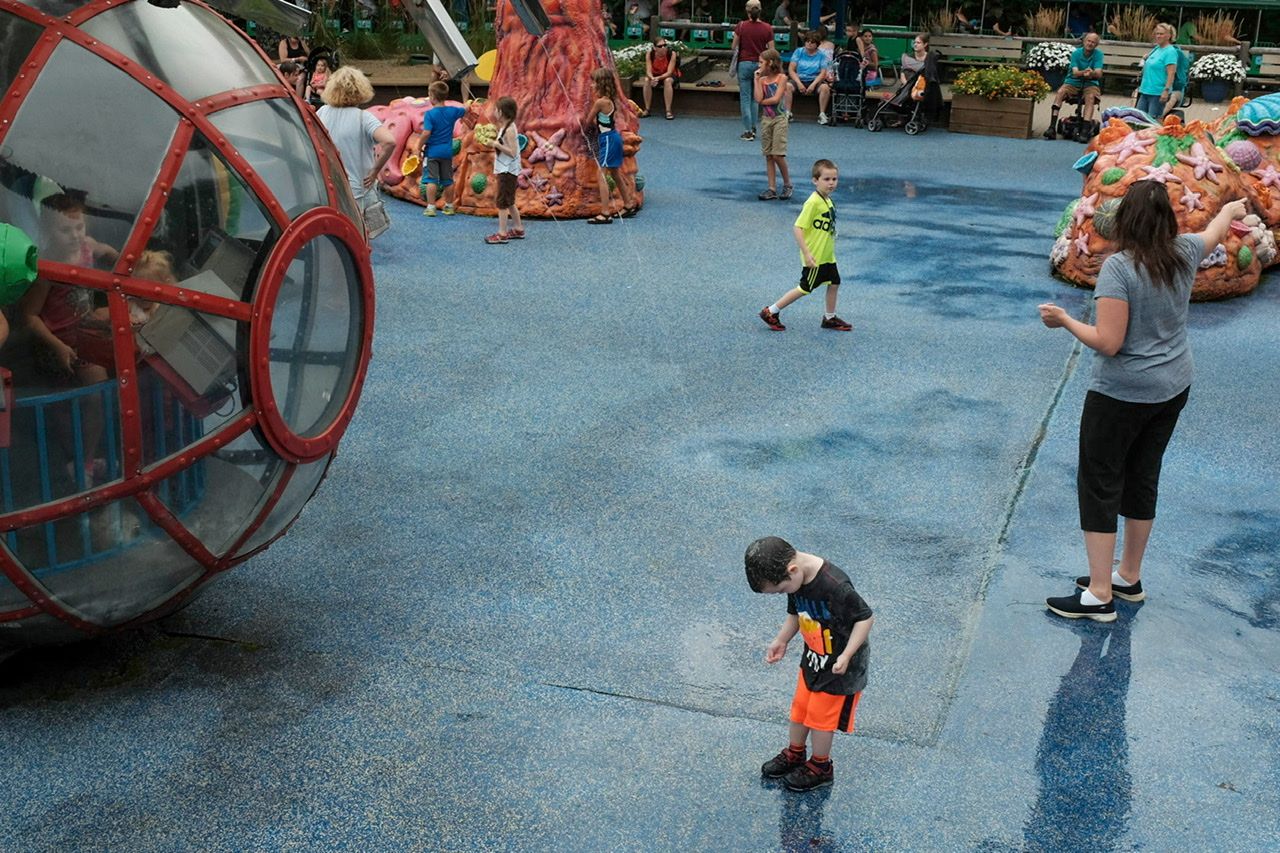 Boy enjoying a water feature