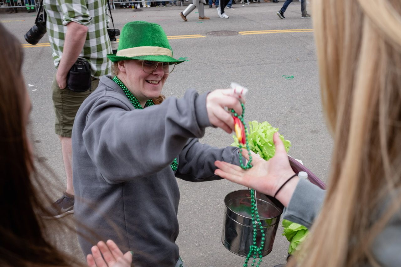 Handing out beads